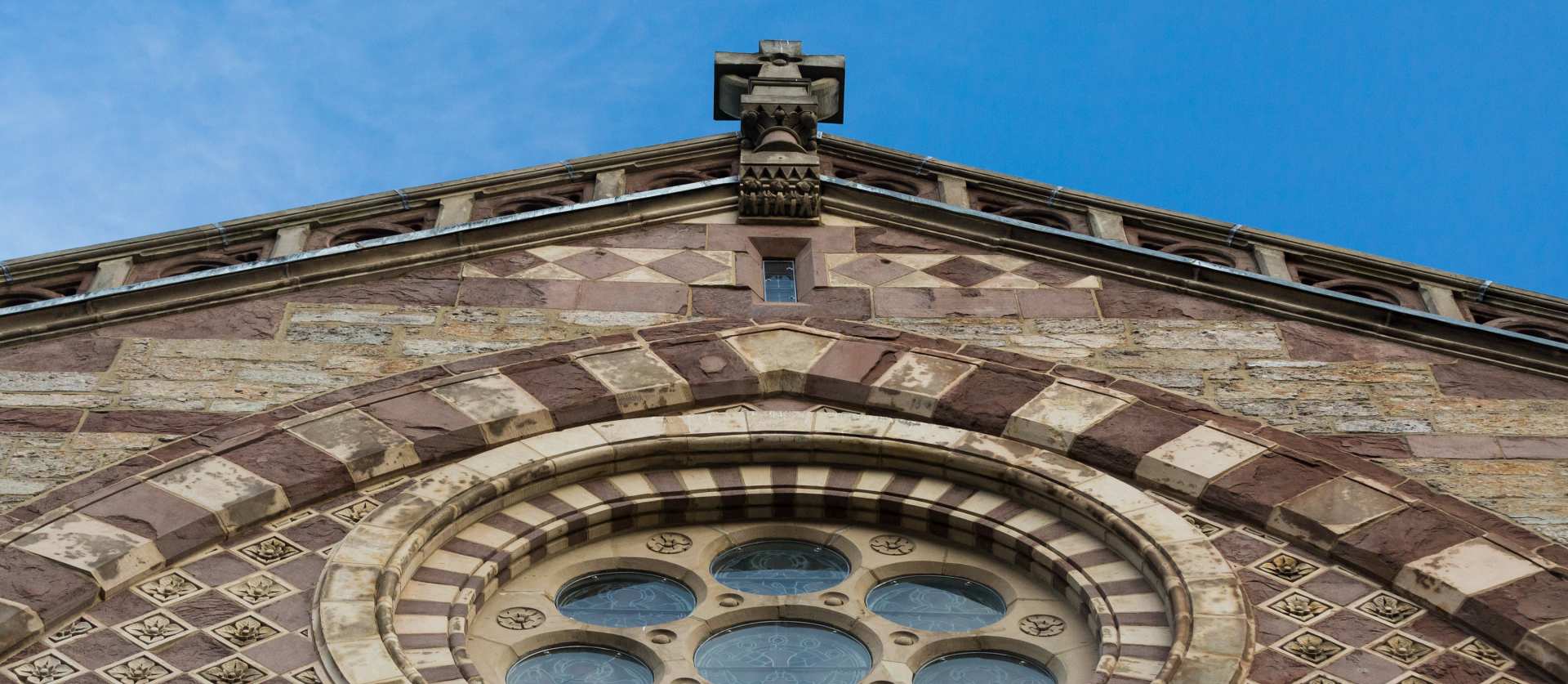 Outside of Old South Church building with stained glass