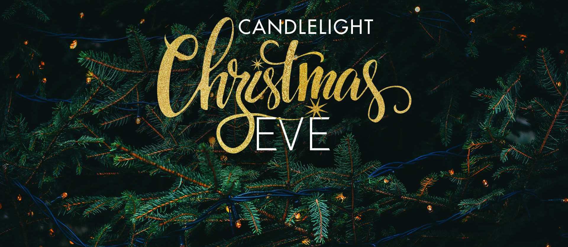"Candlelight Christmas Eve" on a pine tree background